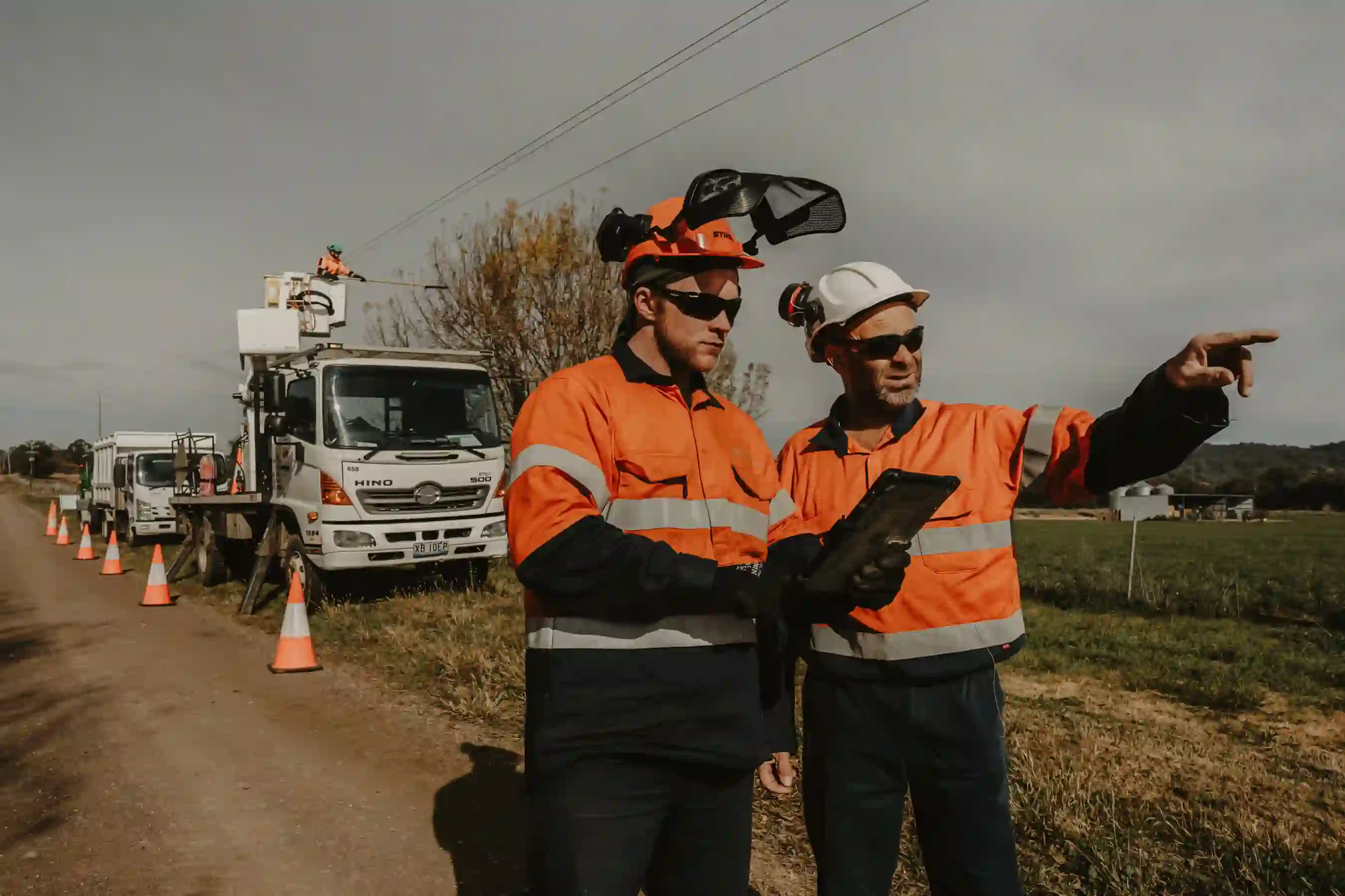 EVM crew members on a dirt road